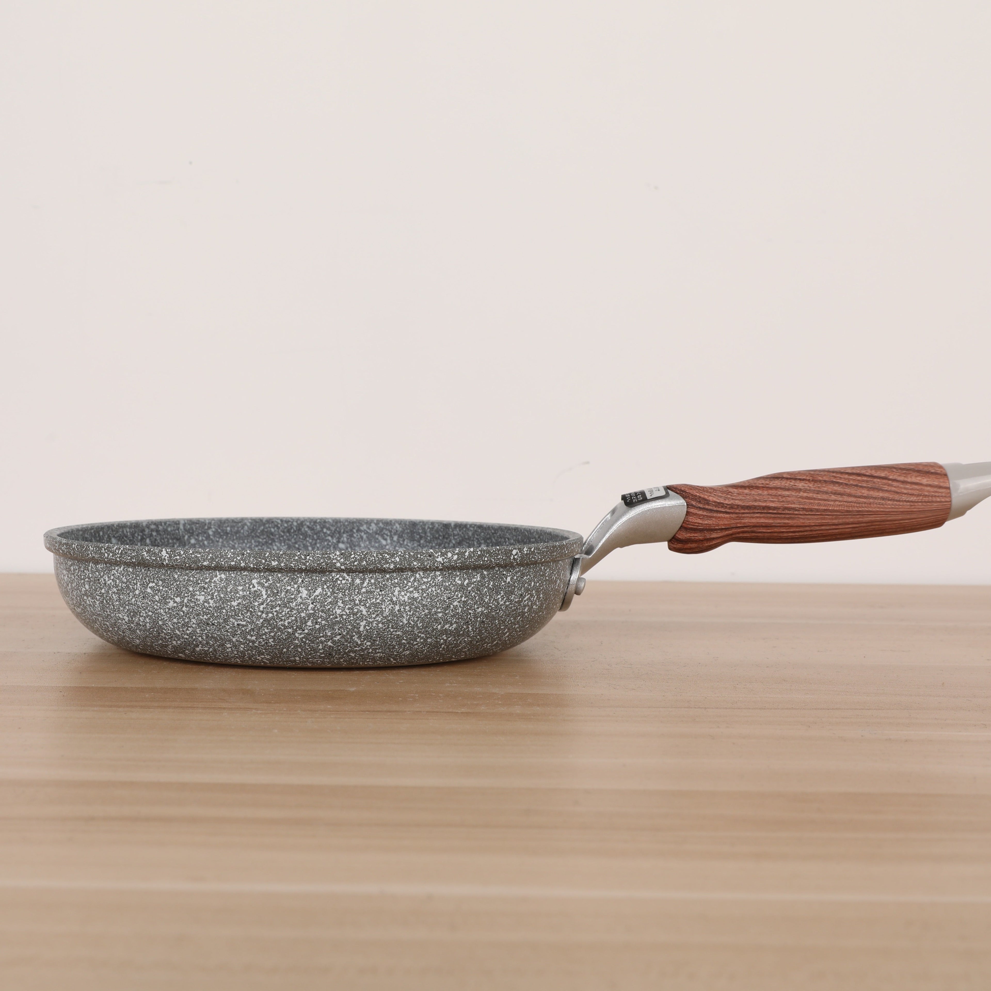 Frying Pan with a Wood Grip